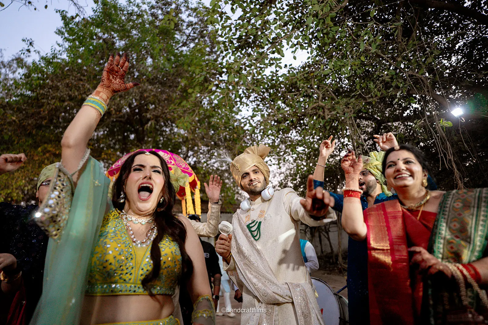 Wedding party dancing during the Baraat procession